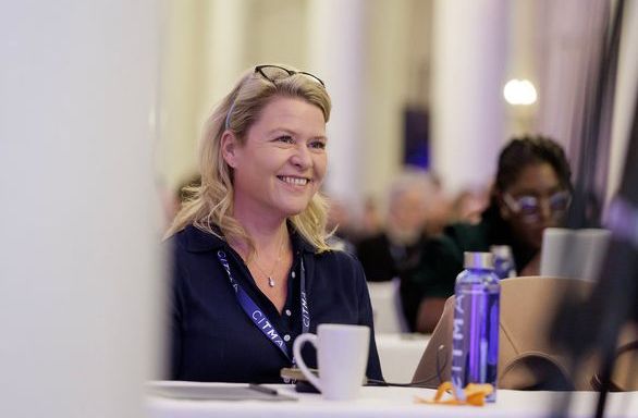 SC25 Blonde woman smiling audience.jpg