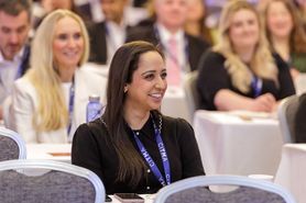 SC25 women smiling in audience.jpg