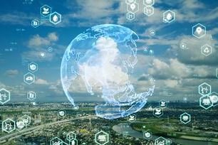 Cityscape with globe and sustainable symbols.jpg