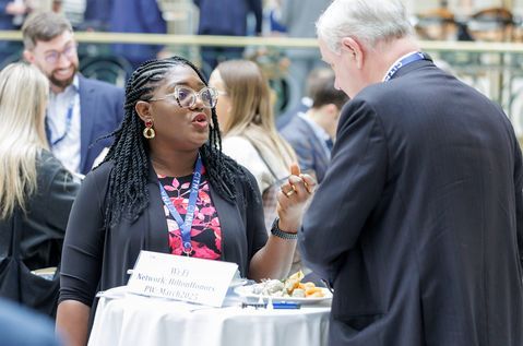 SC25 delegates chatting.jpg