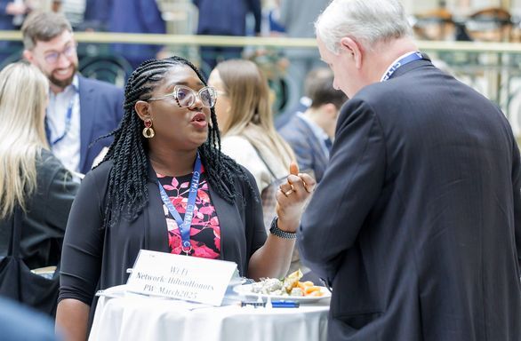 SC25 delegates chatting.jpg