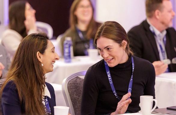 SC25 Two women talking audience.jpg