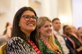 SC23 audience member smiling.jpg