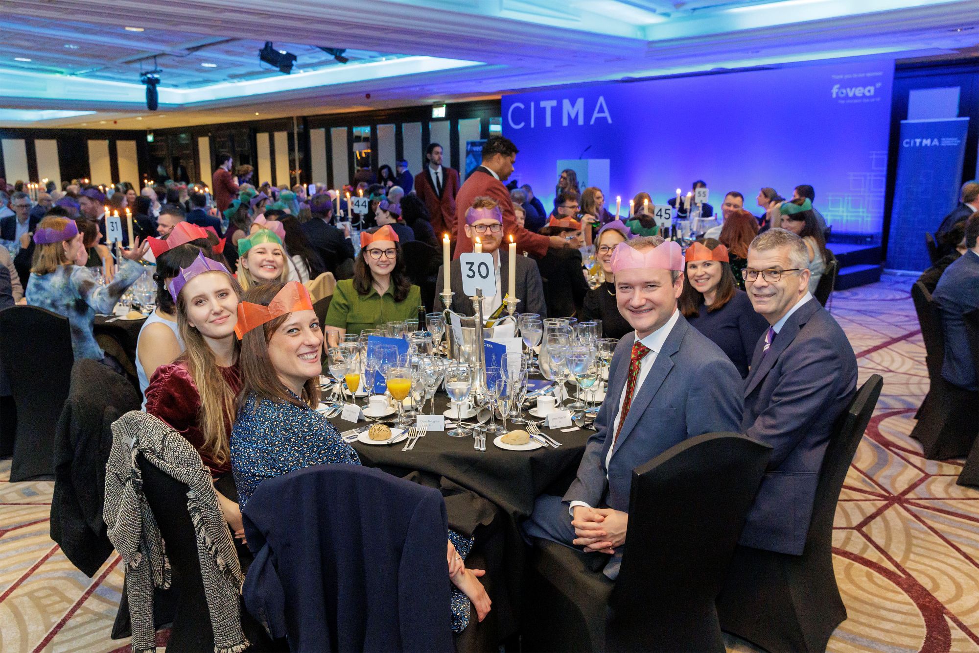 LCL25 guests smiling at dinner.jpg