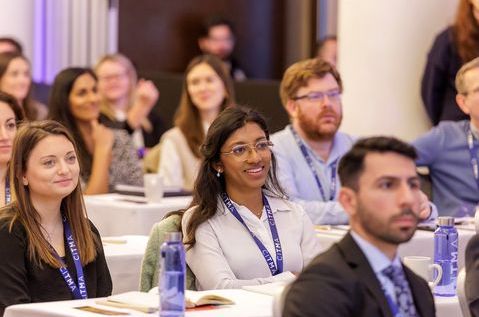 SC25 people in audience smiling.jpg