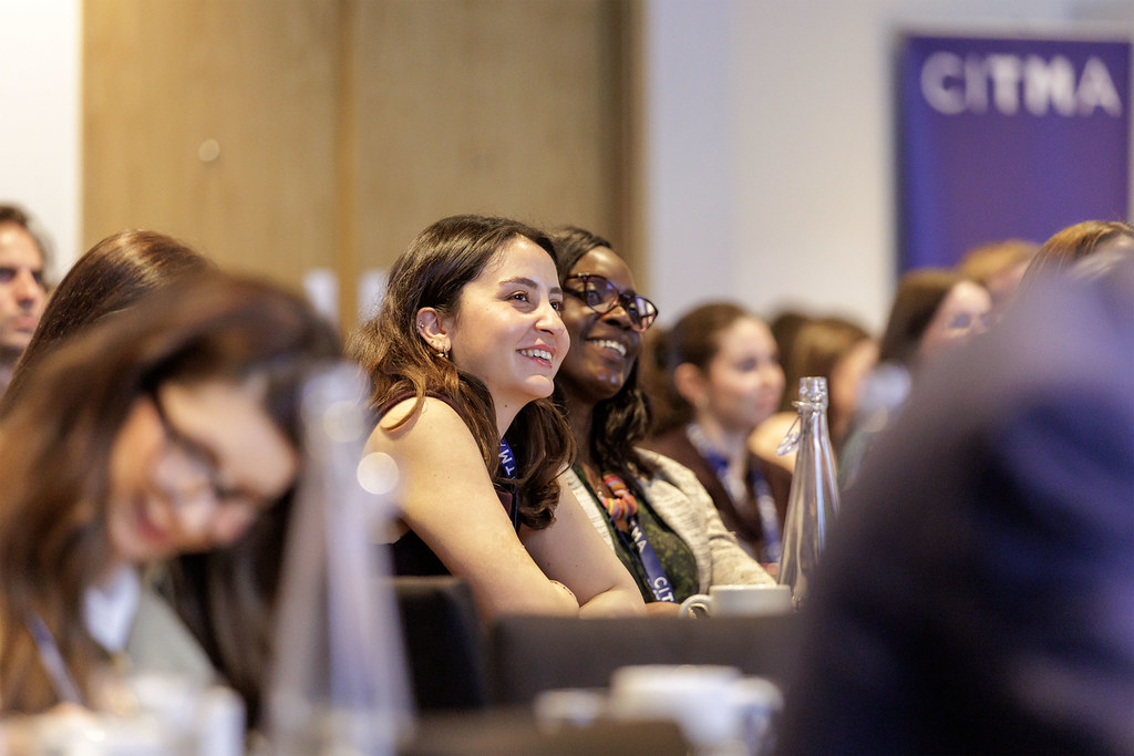 SC26 two womem in crowd smiling.jpg