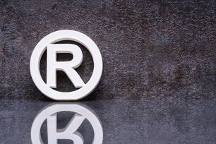 R in circle registered trade mark reflection