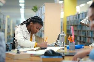 Brand school blog - student in library.jpg