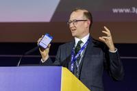 PC25 Mark Wilden with phone.jpg