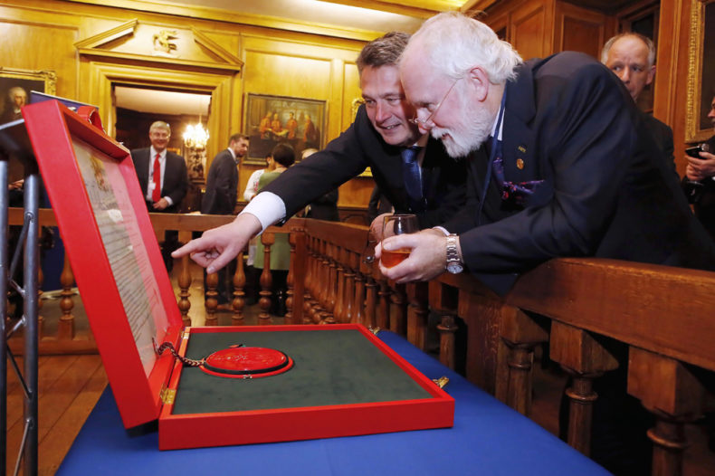 Members look at Royal Charter