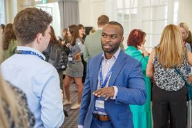 PC24 Man talking networking space.jpg