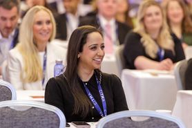 SC25 woman smiling in audience.jpg