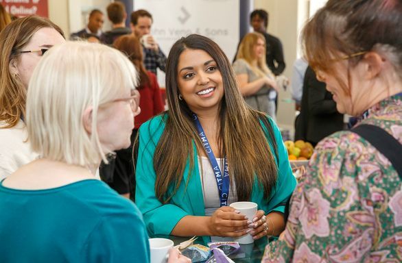 Paralegal Conference 2024 - Woman in blue smiling.jpg