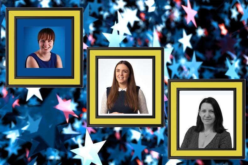 Gold star on black glittery background