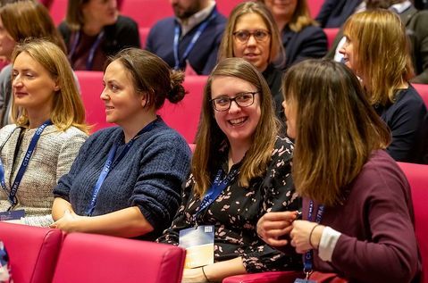 audience women talking.jpg