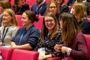 audience women talking.jpg