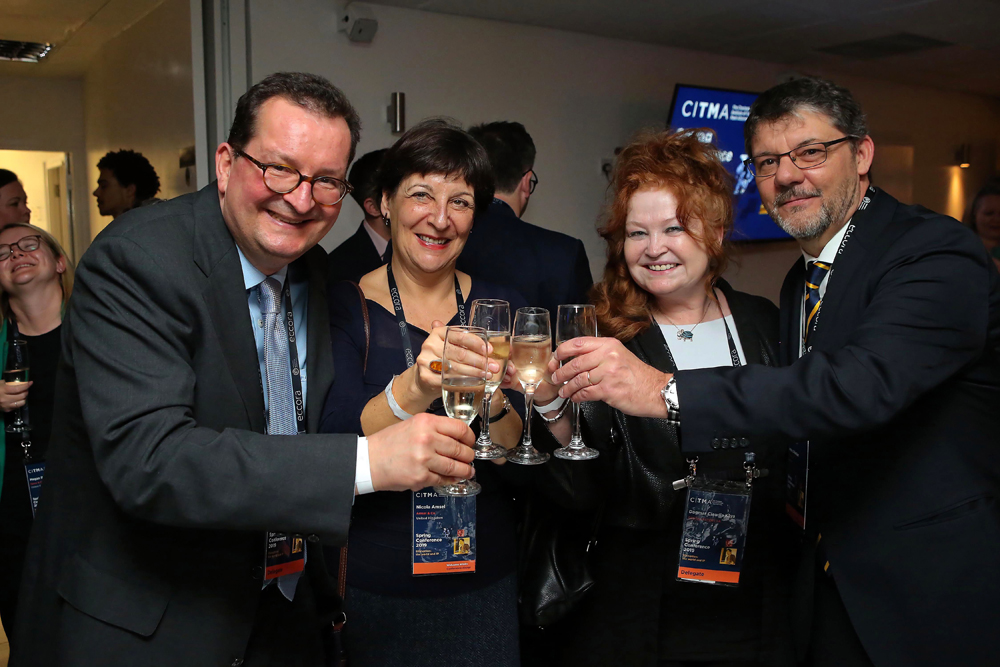 Spring Conference 2019 dinner guests cheers